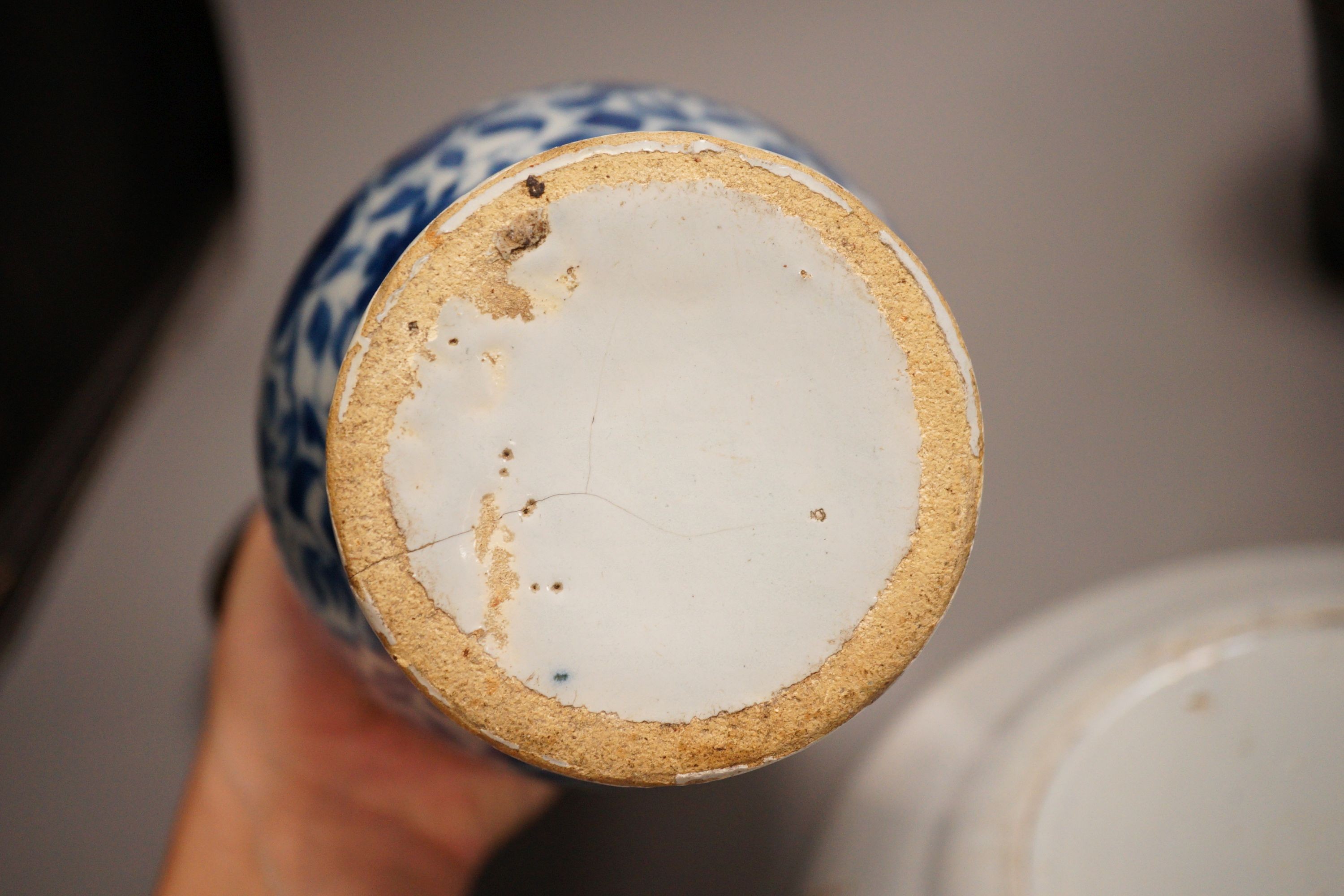 An 18th century Delft blue and white vase, a similar plate and two papier mache boxes, plate diameter 23cm